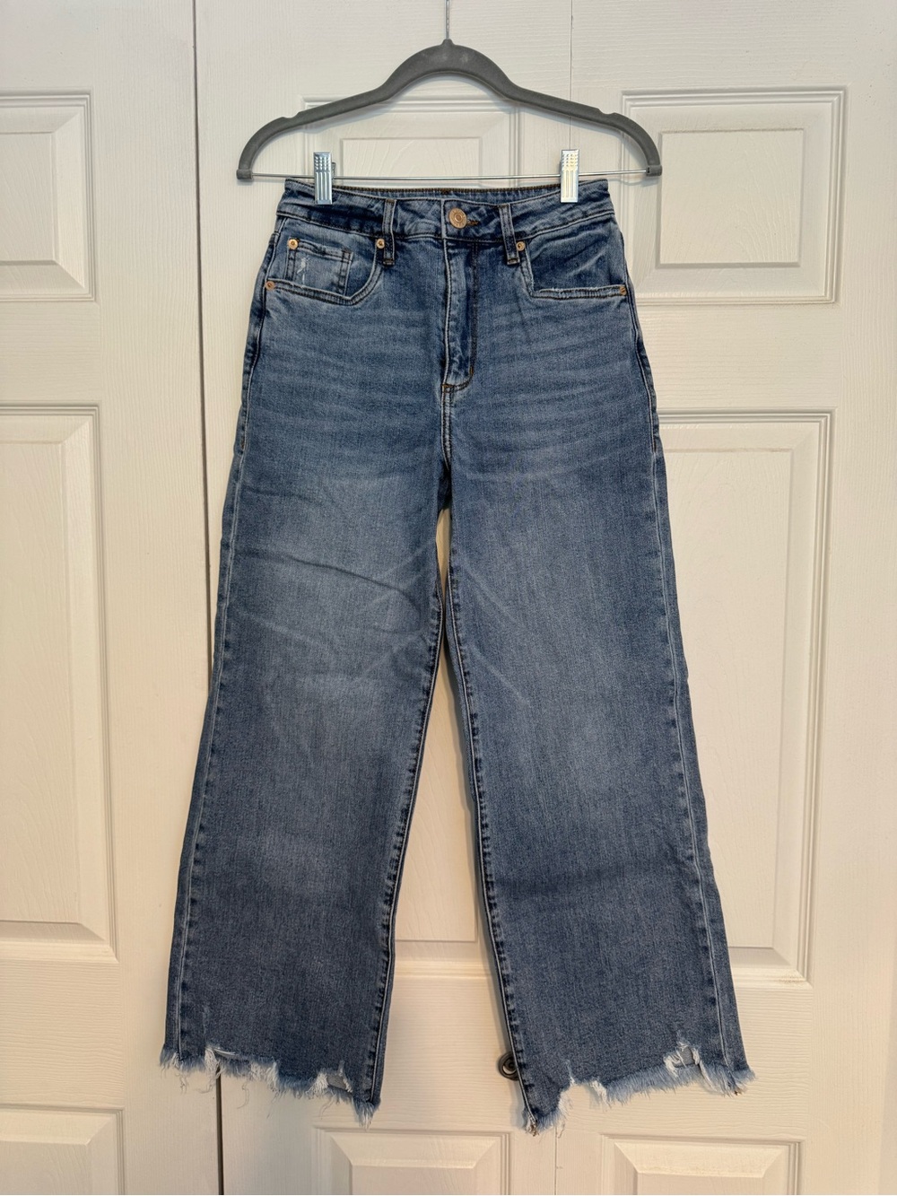 STS Blue High-Rise Wide-Leg Jeans in Faded Blue with Frayed Hem